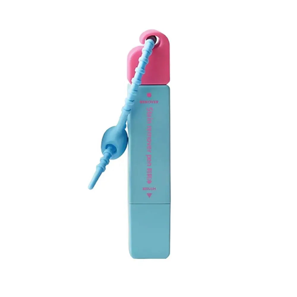 Stain remover pen removing a stain from clothing